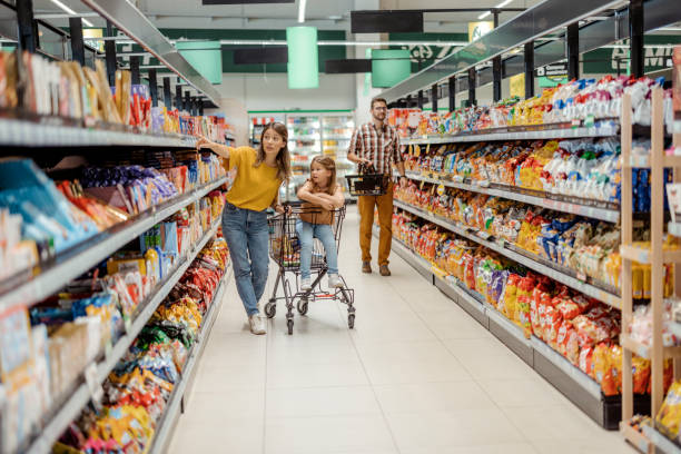 istock Mother With Her Child in Supermarket 1929701221