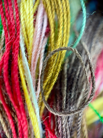 Extreme close up of cotton threads of multi colors