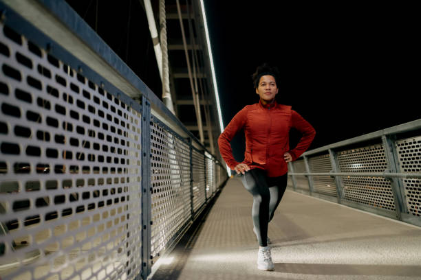 istock Twilight jogging in the city 1929745106