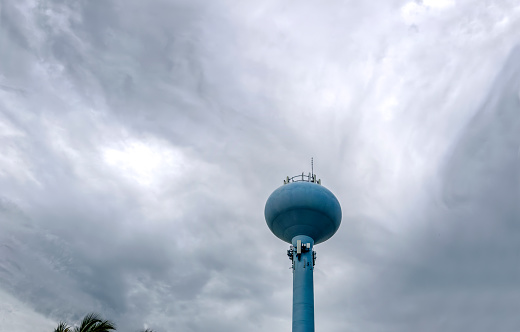 Water tower over cloudy sky in Sarasota, Florida