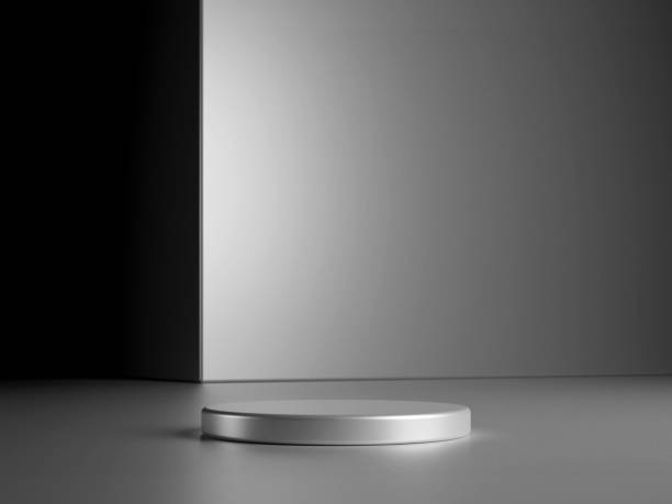 istock Luxury round silver podium with metal cube on dark background. Perfect platform for showing your products. Three dimensional illustration 1929781714