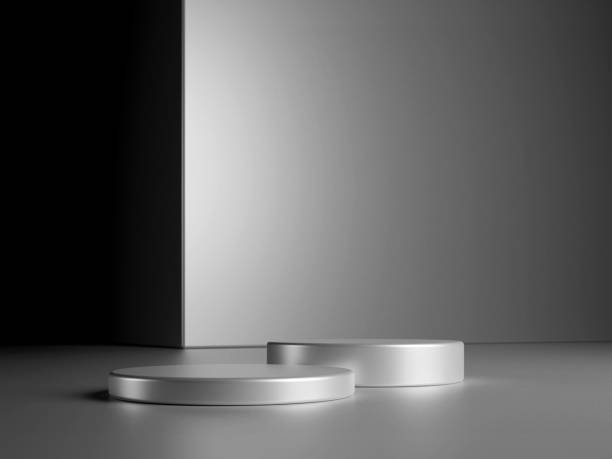 Luxury round silver podium with metal cube on dark background. Perfect platform for showing your products. Three dimensional illustration