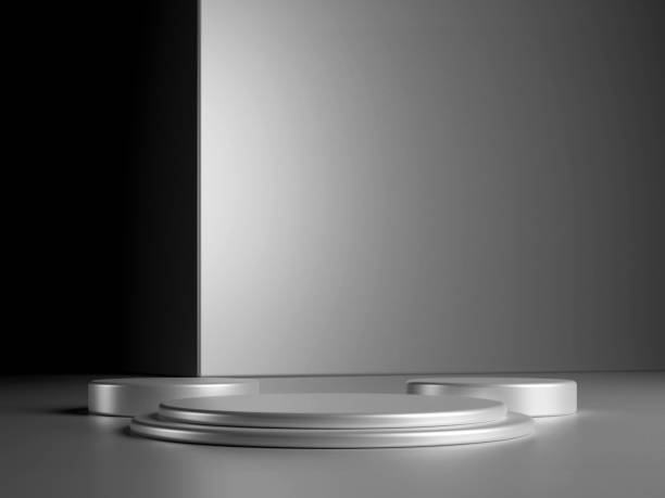 istock Luxury round silver podium with metal cube on dark background. Perfect platform for showing your products. Three dimensional illustration 1929782242