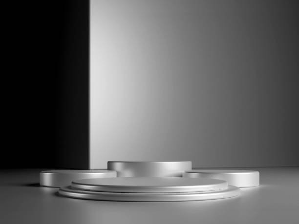 istock Luxury round silver podium with metal cube on dark background. Perfect platform for showing your products. Three dimensional illustration 1929782311