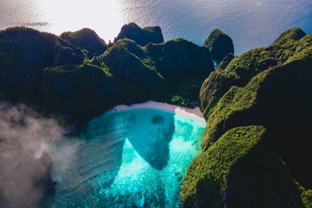 istock Drone view at Maya Bay Koh Phi Phi Thailand, Turquoise clear water white tropical beach 1929812582