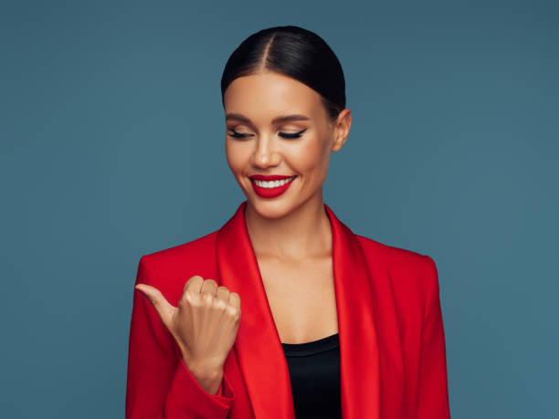 istock Beautiful girl shows signs with her hands 1929843490