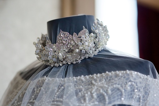 A luxurious tiara for a bride or princess close-up. Jewelry accessories. Selective focus.