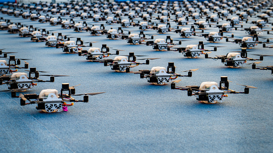 doha, qatar- december 12,2023 : multiple drones lined up for a drone show