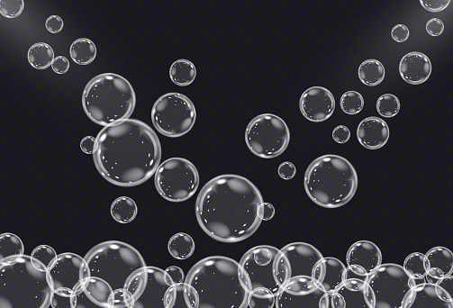 Realistic soap vector bubbles isolated on transparent background. The effect of falling and flying bubbles. Glass bubble effect.