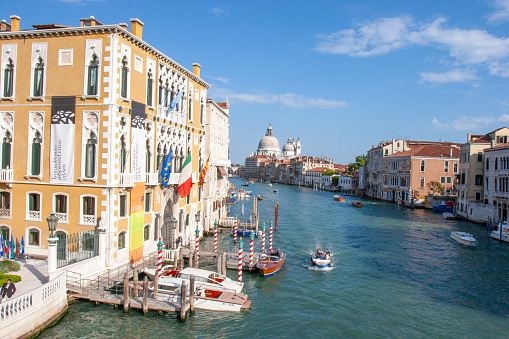 Venice, Italy - September 25, 2005: view to canale Grande in Venice with boats and historic villas.