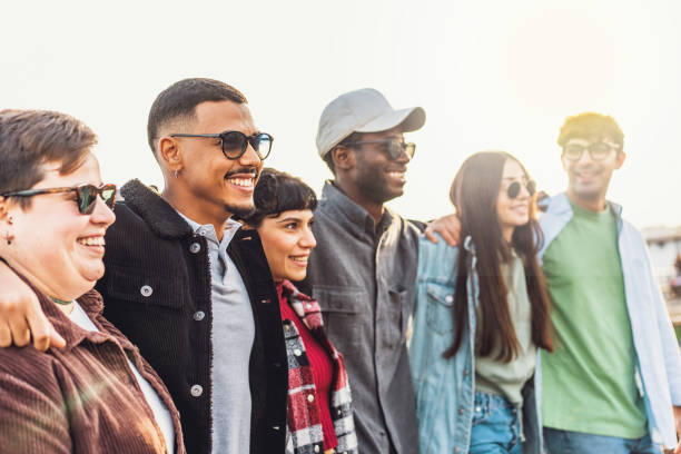 istock Multicultural Friends Walking and Embracing celebrating unity and diversity 1929888084