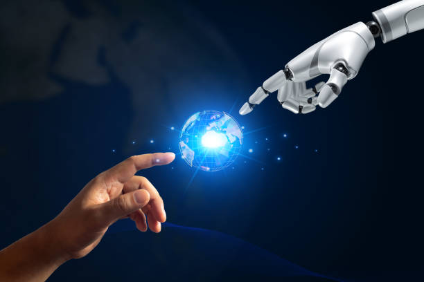 Human and robot hands pointing at the globe