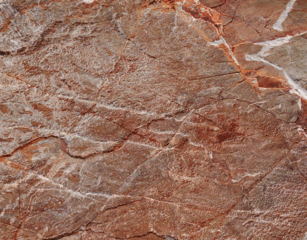 istock Close-up of raw pink marble surface 1929908930