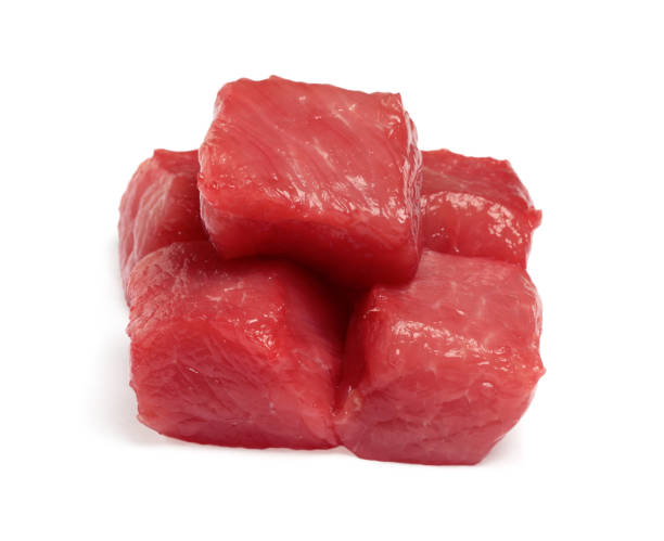 istock Pieces of raw beef isolated on white 1929918843