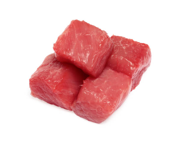 istock Pieces of raw beef isolated on white 1929918845