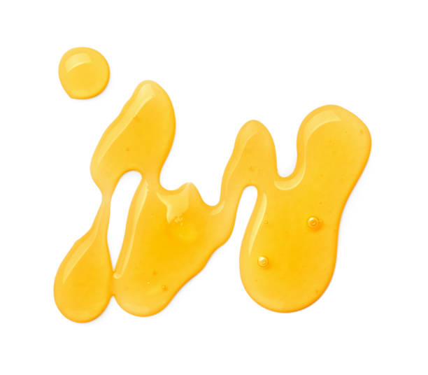 istock Delicious fresh honey isolated on white, top view 1929937715