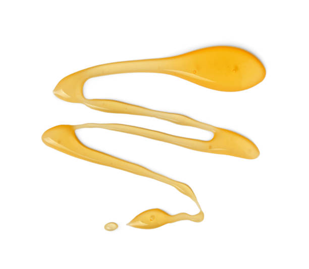 istock Delicious fresh honey isolated on white, top view 1929937716