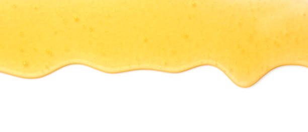 istock Tasty natural honey flowing isolated on white, top view 1929939964