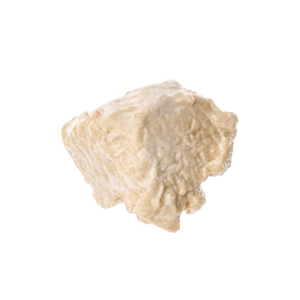 istock One piece of tasty halva isolated on white 1929941087