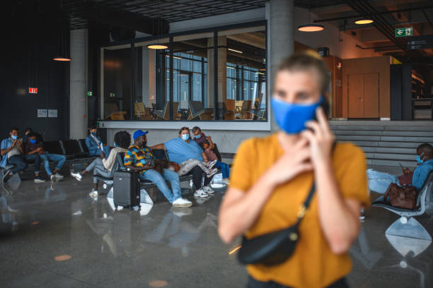 istock Exhausted Diverse Family Waiting At The Airport 1929951012