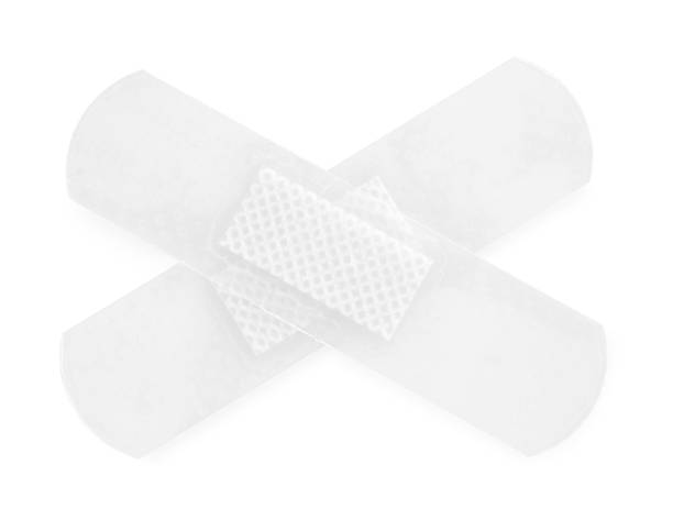 istock Medical adhesive bandages isolated on white, top view 1929959514