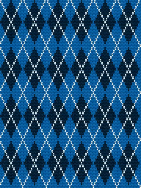 Vector illustration of Argyle print. Seamless knitted pattern with rhombuses in blue, black and white colors