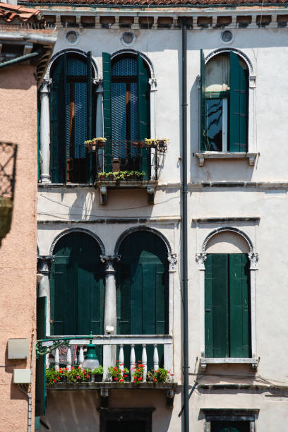 istock Venetian Windows and buildings 1929964164
