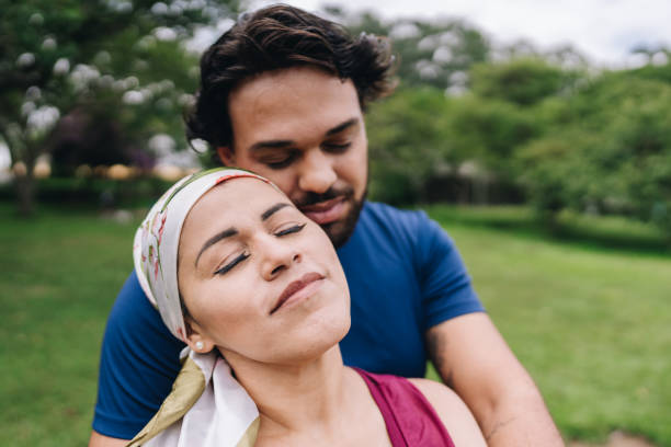 istock Couple embracing at park 1929965287
