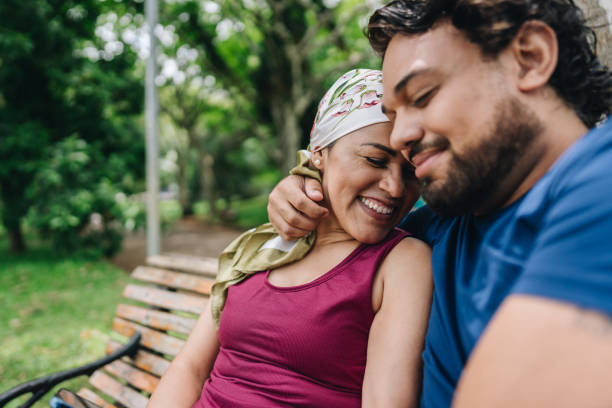 Couple embracing at park