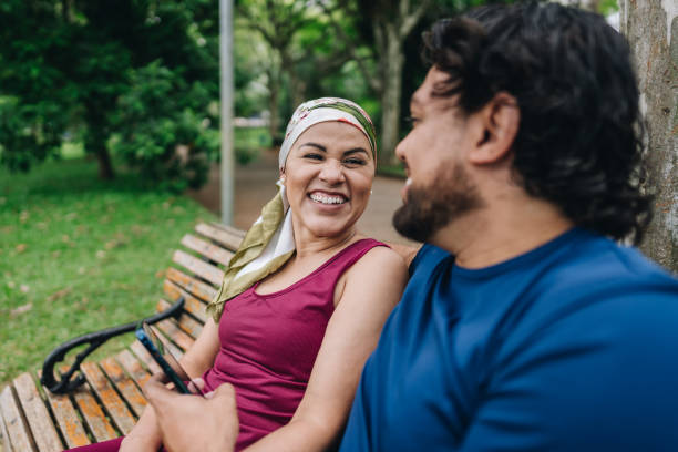 istock Couple talking at park 1929968567