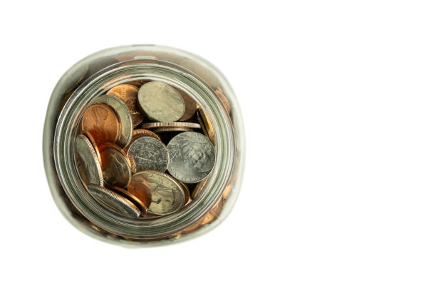 istock Jar of Coins (Top View) 1929981986