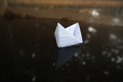 paper boat seen from the front