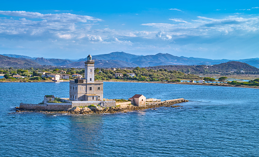 Italy, Sardinia island, the ancient lighthouse at the entrance of the gulf of Olbia