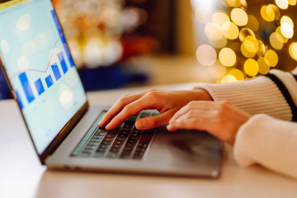istock Hands touching laptop keyboard at home office in holidays. 1930017136