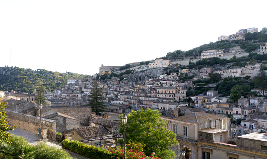 Panoramic view of Sassi di Matera a historic district in the city of Matera, well-known for their ancient cave dwellings from the Belvedere di Murgia Timone,  Basilicata, Italy