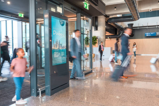 istock Multi-Ethnic Passengers Walking Fast At The Airport 1930040603