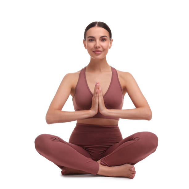 istock Beautiful young woman practicing yoga on white background. Lotus pose 1930047471