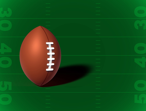 3d rendering of an American football ball with its pointed side up on a dark background. American team game. Contact sport. Sport equipment.