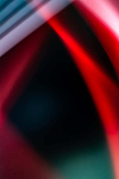 istock Color mixing, light refraction, blurred waves and bokeh, abstract background. Vertical banner. Copyspace. 1930083309