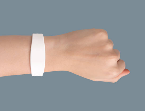 istock Silicon rubber bracelet mockup, key band with chip on hand wrist 1930097404