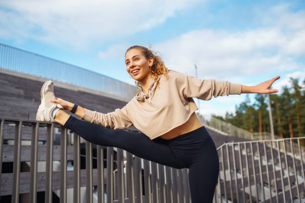 istock Fit woman exercising outdoors. 1930101607