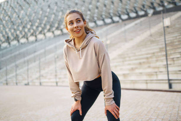 istock Fit woman exercising outdoors. 1930102140