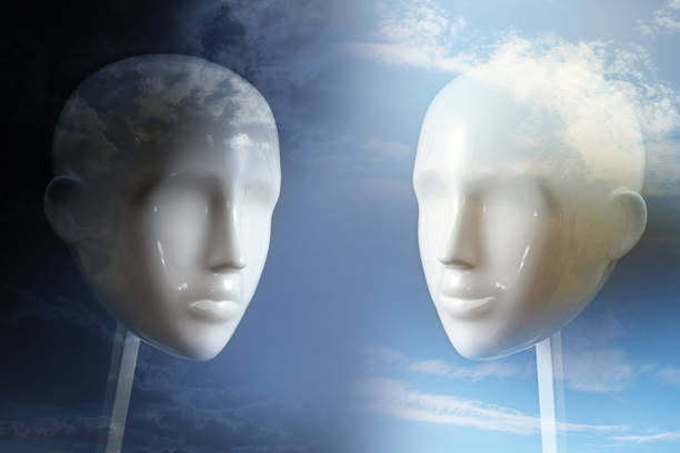 Negative versus positive thinking and emotion, psychology concept shown with two neutral colored mannequin heads and corresponding dark and light sky, copy space, selected focus