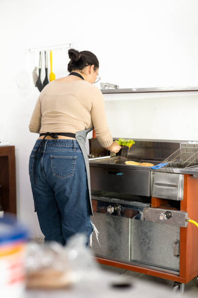 istock working in kitchen, chef lifestyle, food preparation in restaurant, tools and occupations 1930185696