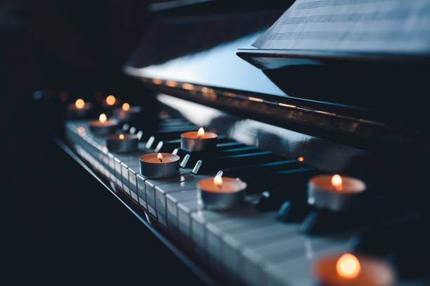 istock Romantic atmosphere with candles and piano 1930233838