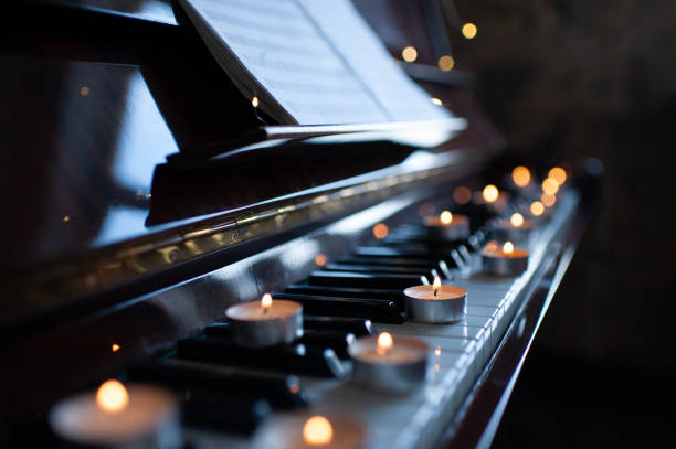 istock Romantic atmosphere with candles and piano 1930234366