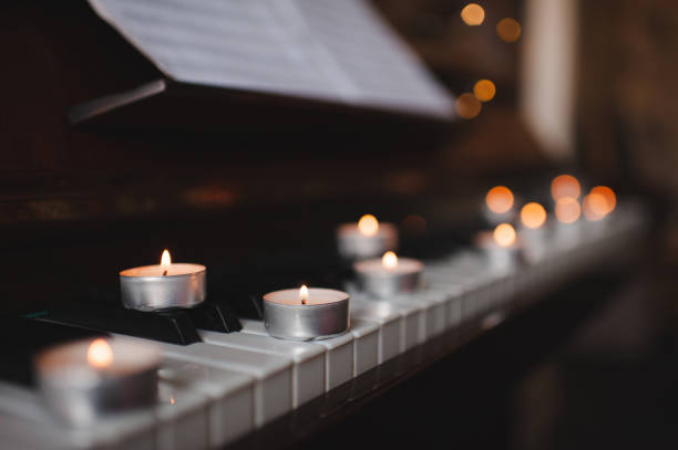 istock Romantic atmosphere with candles and piano 1930235414