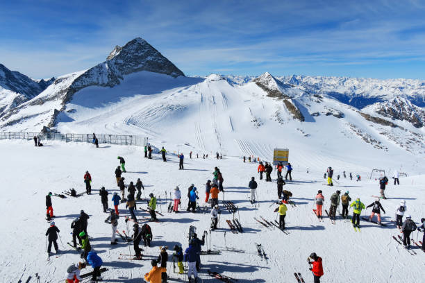 Gondola station on the glacier in Hintertux - Austria. There is skiing on the Hintertux Glacier all year round, 365 days a year. The skiers enjoy the beautiful weather in the sunshine.