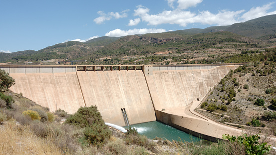 The dam at Embalse de Rules. VÃ©lez de Benaudalla, Andalucia, Spain