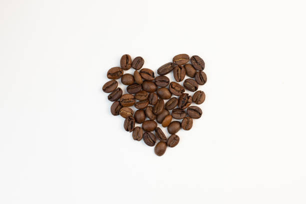 istock heart shape made from coffee beans isolated on white background, valentines day, romantic 1930481337